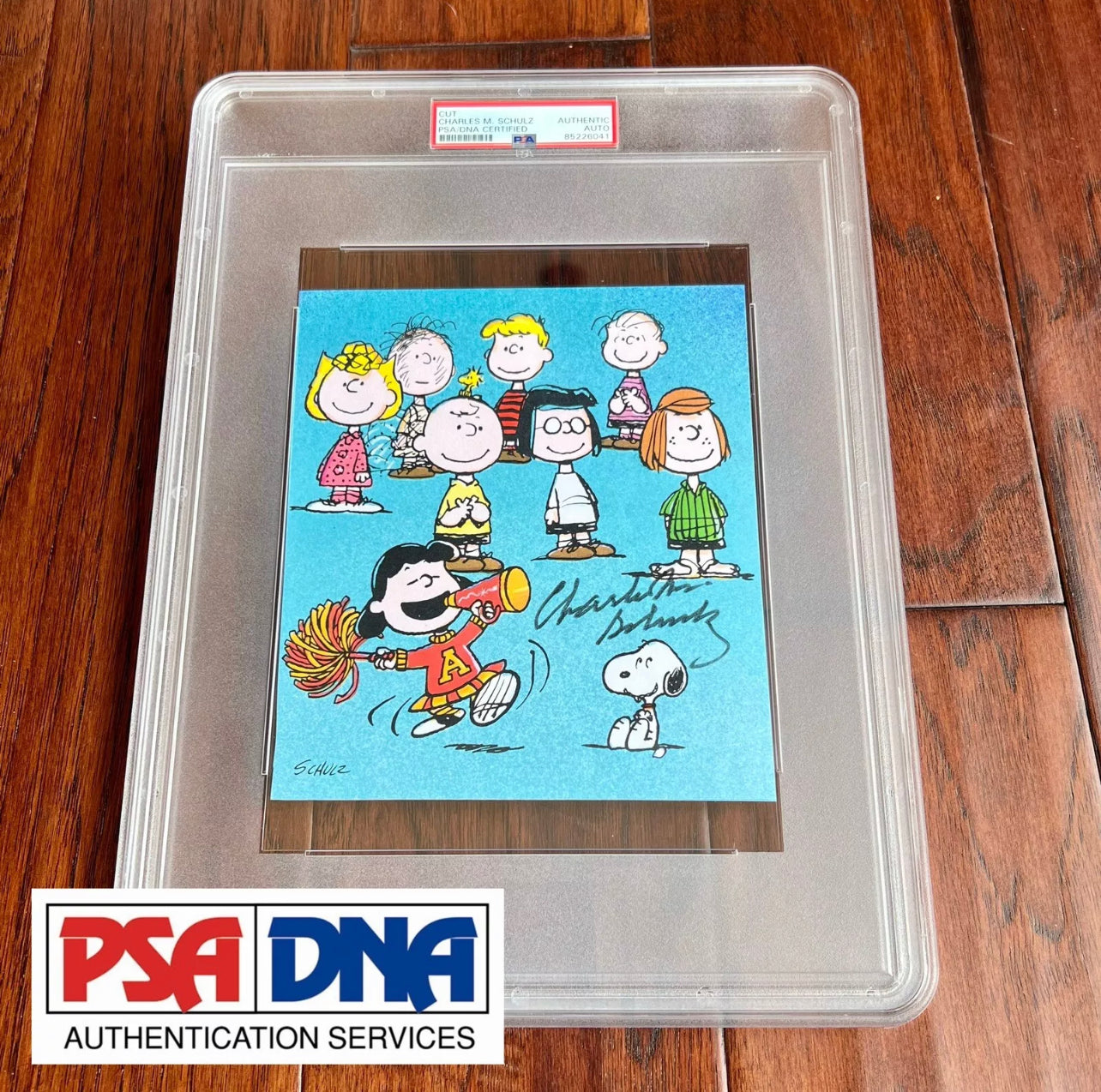 CHARLES M SCHULZ * PSA * Autograph CHARLIE BROWN "Peanuts Party" Signed * SNOOPY